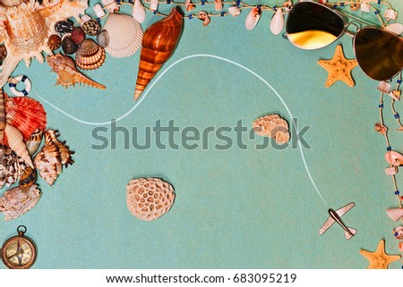 Trip to exotic islands concept. Map made of shells and star fish with aircraft route, sunglasses, vintage compass