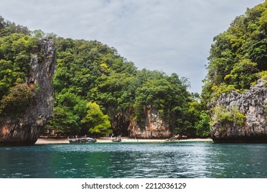 Trip In Thailand. The Mountain Is Overgrown With Tropical Greenery With A Sandy Shore And A Turquoise Sea. Excursion To Hong Island, National Park Near Krabi Province. Wanderlust Travel.