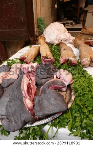 Tripe, hooves and meat  in a butcher shop in the medina of Fes, Morocco, Africa