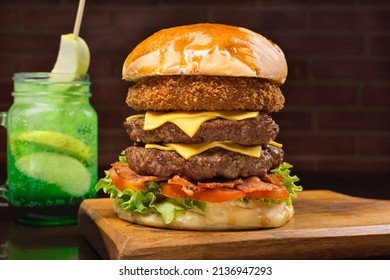 Triple Burger In A Wood Table