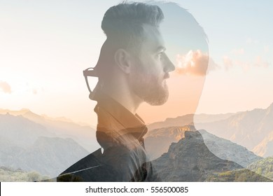 Triple exposure portrait of a businessman combinated with beautiful mountain landscape on the sunset - Shutterstock ID 556500085