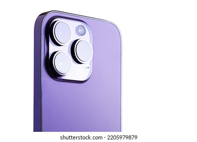 Triple lens camera on modern mobile phone's back - Shutterstock ID 2205979879