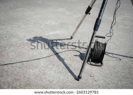 Tripod with Cable Roll Shadow