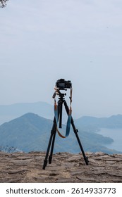 tripod with camera at the peak