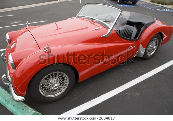 The Triumph TR-3 was a popular sports car of the\
1950s and 1960s