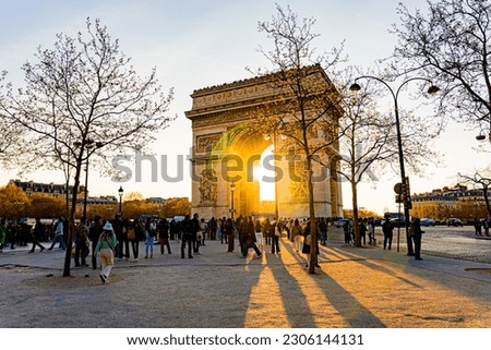 Triumphal Arch (Arc de Triomphe) in Paris during sunset