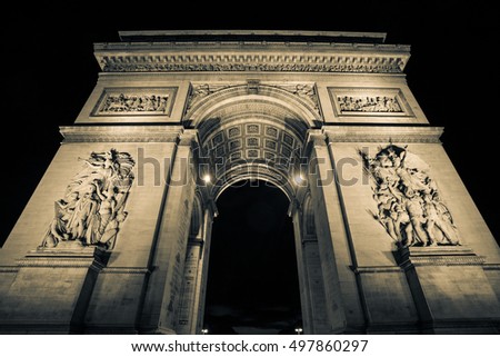 Arc de triomphe in Paris at dark night