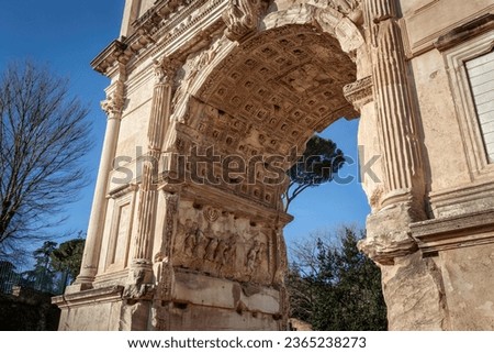 The Triumphal arch of Roman emperor Titus with relief of the Menorah and the Ark of the Covenant on Forum Romanum in Rome, Italy