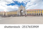 Triumphal arch at Rua Augusta at Commerce square timelapse hyperlapse in Lisbon, Portugal. Cloudy sky. After the great 1775 Lisbon earthquake earthquake the square was completely remodeled.