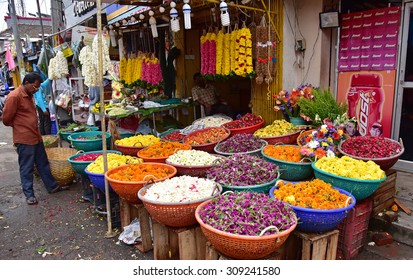 TRIVANDRUM, KERALA, INDIA, AUGUST 22, 2015: Flower Trade. Chala, The Busy Market Place In The Capital City, On A Bright Sunny Day. A Ramshackle Flower Shop At Onam Time.