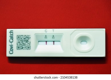 Trivandrum, Kerala, India, January 11, 2022: Disposable Rapid Antigen Test Kit For The Detection Of Covid Virus In The Nasal Swab. Cassette Showing Positive Result. Flat Lay                           