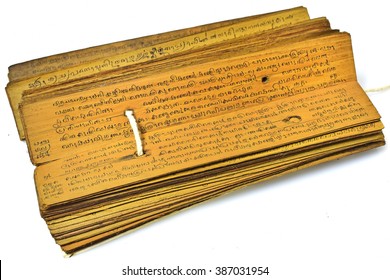 TRIVANDRUM, KERALA, INDIA, SEPTEMBER 09, 2016: Restored Palm Leaf (Borassus Flabellifer) Manuscript. Opened Book Showing Writings About Ayurvedic Medicines And Their Uses In Old Malayalam Script.