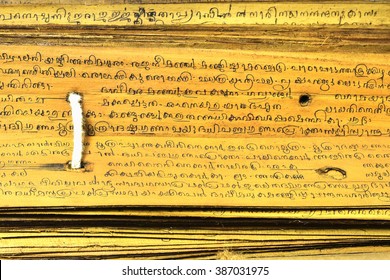 TRIVANDRUM, KERALA, INDIA, SEPTEMBER 09, 2016: Restored Palm Leaf (Borassus Flabellifer) Manuscript. Opened Book Describing Ayurvedic Medicines And Their Uses In Old Malayalam Script, Top Down View.