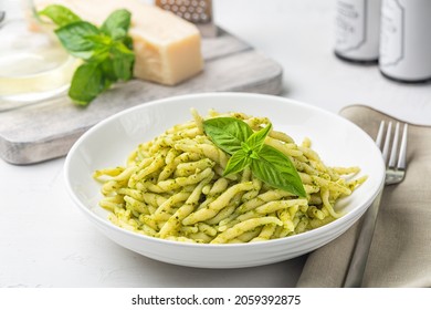 Trofie al pesto, italian pasta with pesto sauce made from basil leaves, parmesan cheese, pine nuts, garlic, olive oil.