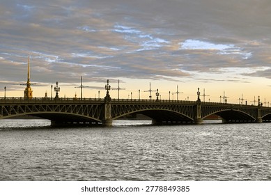 Troitsky (Trinity) Bridge, 10-span structure ofopening system with single-wing draw span at left bank Neva river on summer morning. St. Petersburg