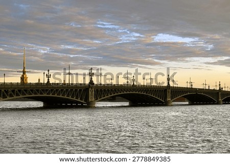 Troitsky (Trinity) Bridge, 10-span structure ofopening system with single-wing draw span at left bank Neva river on summer morning. St. Petersburg