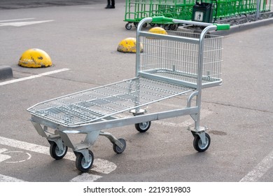 Trolley For Shopping Building Materials In The Car Park. Trade In Products.