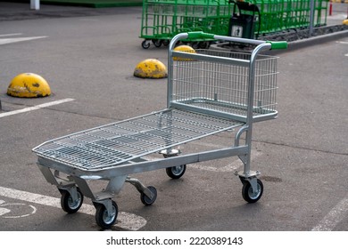 Trolley For Shopping Building Materials In The Car Park. Trade In Products.