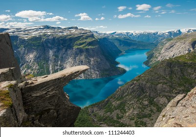 Trolltunga, Troll's tongue rock above lake Ringedalsvatnet, Norway - Powered by Shutterstock