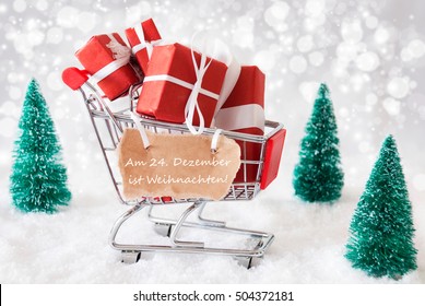 Trollye With Christmas Presents Or Gifts. Snowy Scenery With Snow And Trees. Sparkling Bokeh Effect. Label With German Text Weihnachten Means Christmas - Powered by Shutterstock