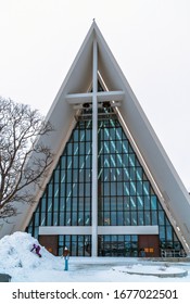 Tromsø, Troms Og Finnmark / Norway -March 5th, 2010: The Arctic Cathedral With Some Kids Playing With The Snow In Winter