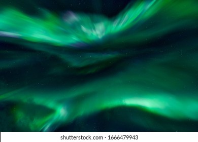 Tromso, Norway - 02 29 2020: northernlights dancing near Tromso at the nightsky