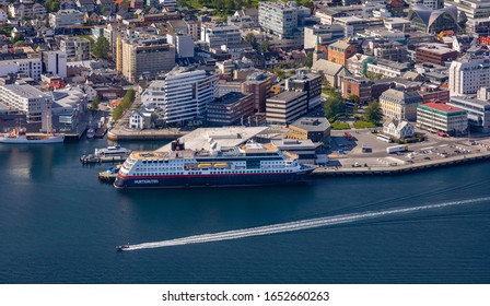 TROMSO, NORWAY - JULY 11, 2019: Aerial View Of Hurtigruten Cruise Ship Dock, City Of Tromsø, On Island Of Tromsøya.