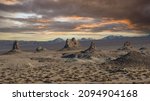 Trona Pinnacles look like a scene from a sci fi movie in late afternoon light. The pinnacles are located by the town of Trona and are often used as movie locations. 