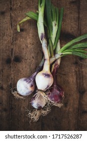 Tropea Onion On Wooden Table. Traditional Italian Food Product From The Calabria Region