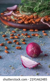 Tropea Onions And Pinto Beans From Italian Garden On Teal Background. Rosemary. Grandma Home Cooking.