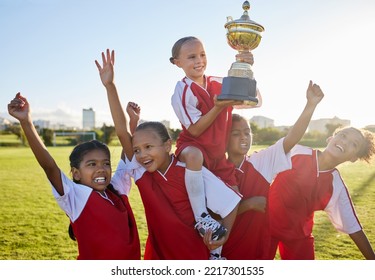 Trophy, winner and football children with success, winning and excited celebration for sports competition or game on field. Happy soccer girl kids team with motivation, celebrate winning achievement - Powered by Shutterstock