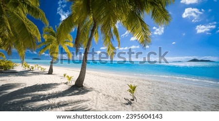 Tropical beach in Aitutaki Lagoon in the Cook Islands in the South Pacific Ocean.
