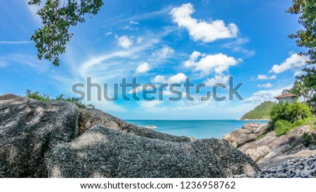 Similar – Sea waves breaking against cliff