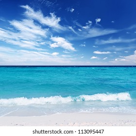 Tropical Beach. Blue Sky And Clear Water.