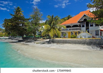 Tropical Beach And Caribbean Houses On Bequia Island