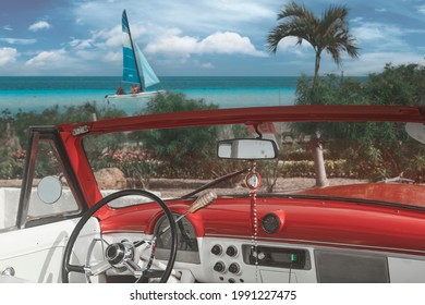 The tropical beach of Cayo Coco in Cuba with american classic car, palm trees on a summer day with turquoise water. Vacation background - Powered by Shutterstock