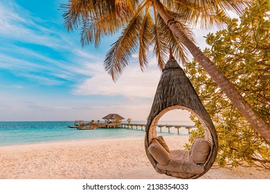 Tropical beach sunset as summer landscape with luxury resort beach palm swing hammock, sand seaside shore for sunset beach landscape. Tranquil beach horizon scenery vacation and summer holiday concept - Shutterstock ID 2138354033