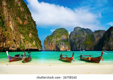 Tropical beach, traditional long tail boats, famous Maya Bay, Thailand