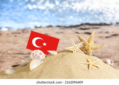 Tropical Beach With Turkey Flag. The Concept Of A Paradise Vacation On The Beaches Of Turkey.