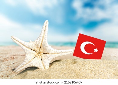 Tropical Beach With Turkey Flag. The Concept Of A Paradise Vacation On The Beaches Of Turkey.