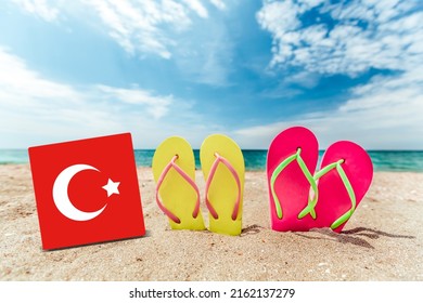 Tropical Beach With Turkey Flag. The Concept Of A Paradise Vacation On The Beaches Of Turkey.