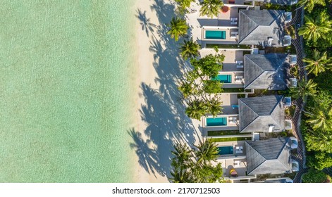 Tropical Beach And Water Bungalows. Travel And Tourism To Luxury Resorts In The Maldives Islands. Summer Holiday Concept Maldives