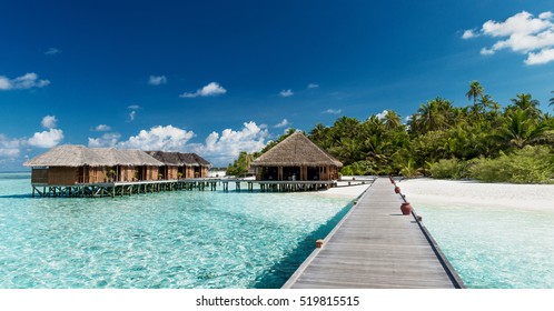 Tropical Beach with Water-Bungalows on the Maldives
