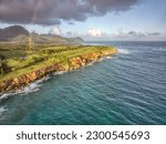 The tropical beaches of Poipu on the rocky southern shore of Kauai Island in Hawaii