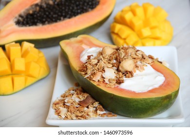 Tropical Coconut Macadamia Nut Granola With Fresh Fruits