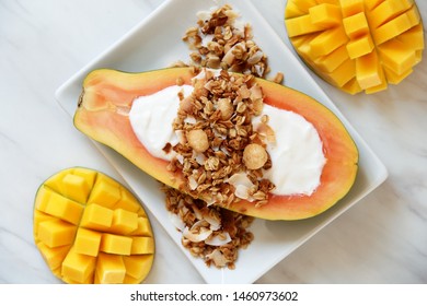 Tropical Coconut Macadamia Nut Granola With Fresh Fruits