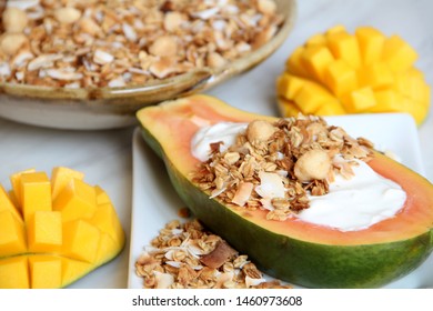 Tropical Coconut Macadamia Nut Granola With Fresh Fruits