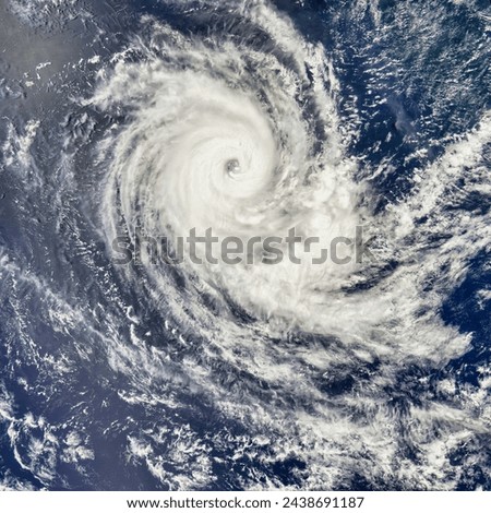 Tropical Cyclone Carina. Tropical Cyclone Carina appears as a tightly wound spiral in the Indian Ocean in this satellite view of the storm,. Elements of this image furnished by NASA.