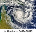 Tropical Cyclone Ingrid 22P east of the Cape York Peninsula, Australia. . Elements of this image furnished by NASA.