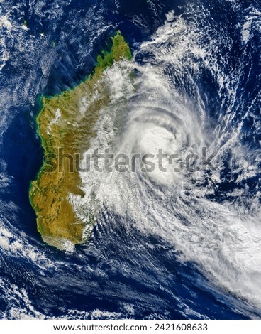 Tropical Cyclone Manou 28S over Madagascar. . Elements of this image furnished by NASA.